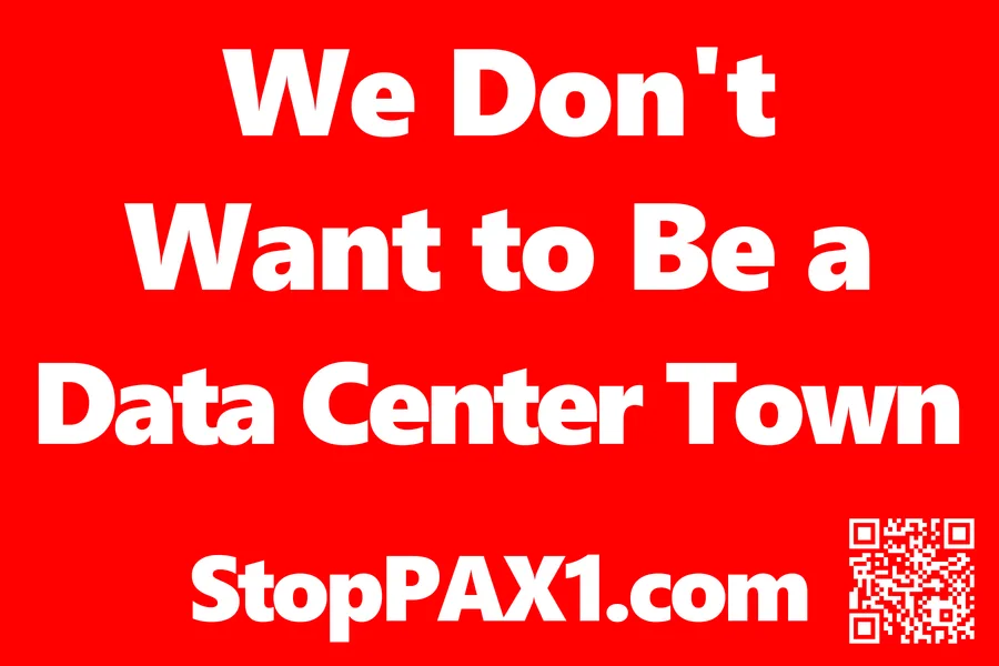White block lettering on a red background reading "We Don't Want to Be a Data Center Town" above "StopPAX1.com" and a QR code.